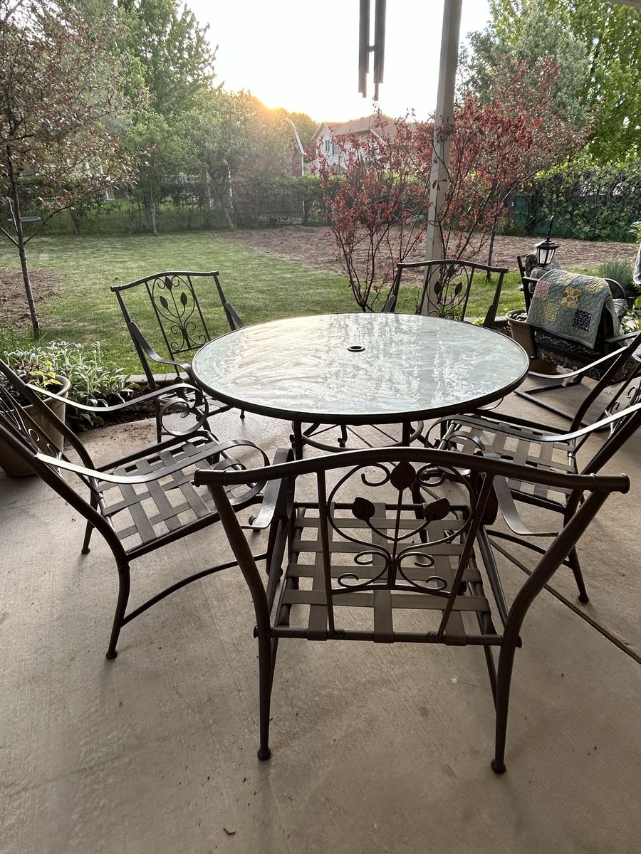 Glass Table and Metal Chairs