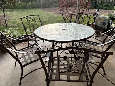 Glass Table and Metal Chairs