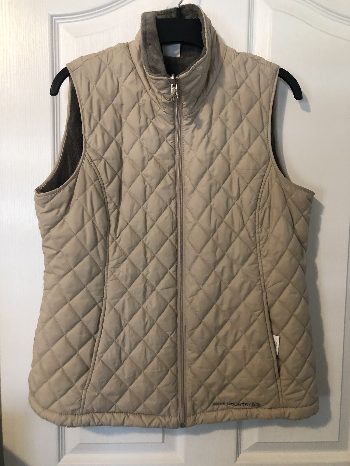 Free Country quilted vest in a versatile beige/tan color
