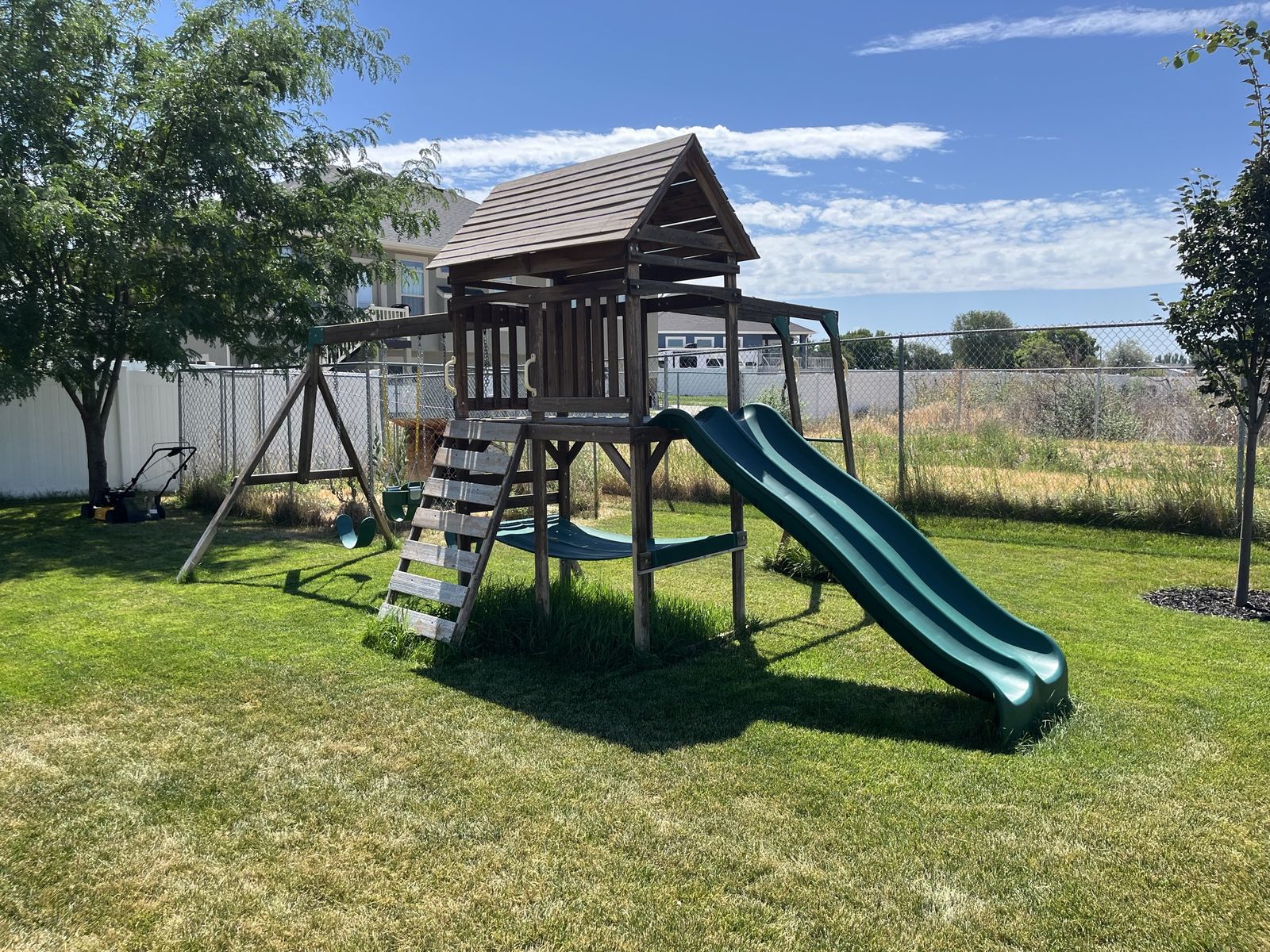 Used Backyard Wooden Playset with Slide, Swings, and Climbing Ladder - Great for Kids