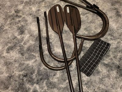 Kayak wall hangers and paddle