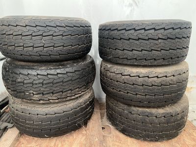 6 Trailer Tires 20.5x8.0-10, 6 Ply Tubeless on 5 Lug Rims - 3 New, 3 Used