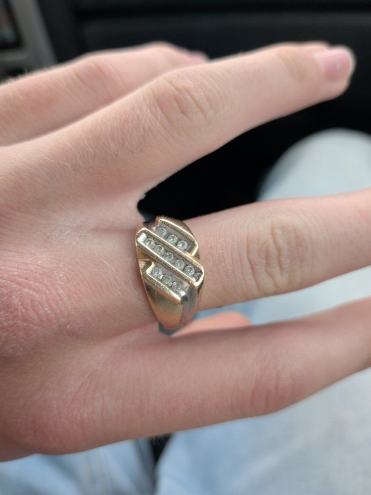 diamond and gold ring, with goochie Rolex watch
