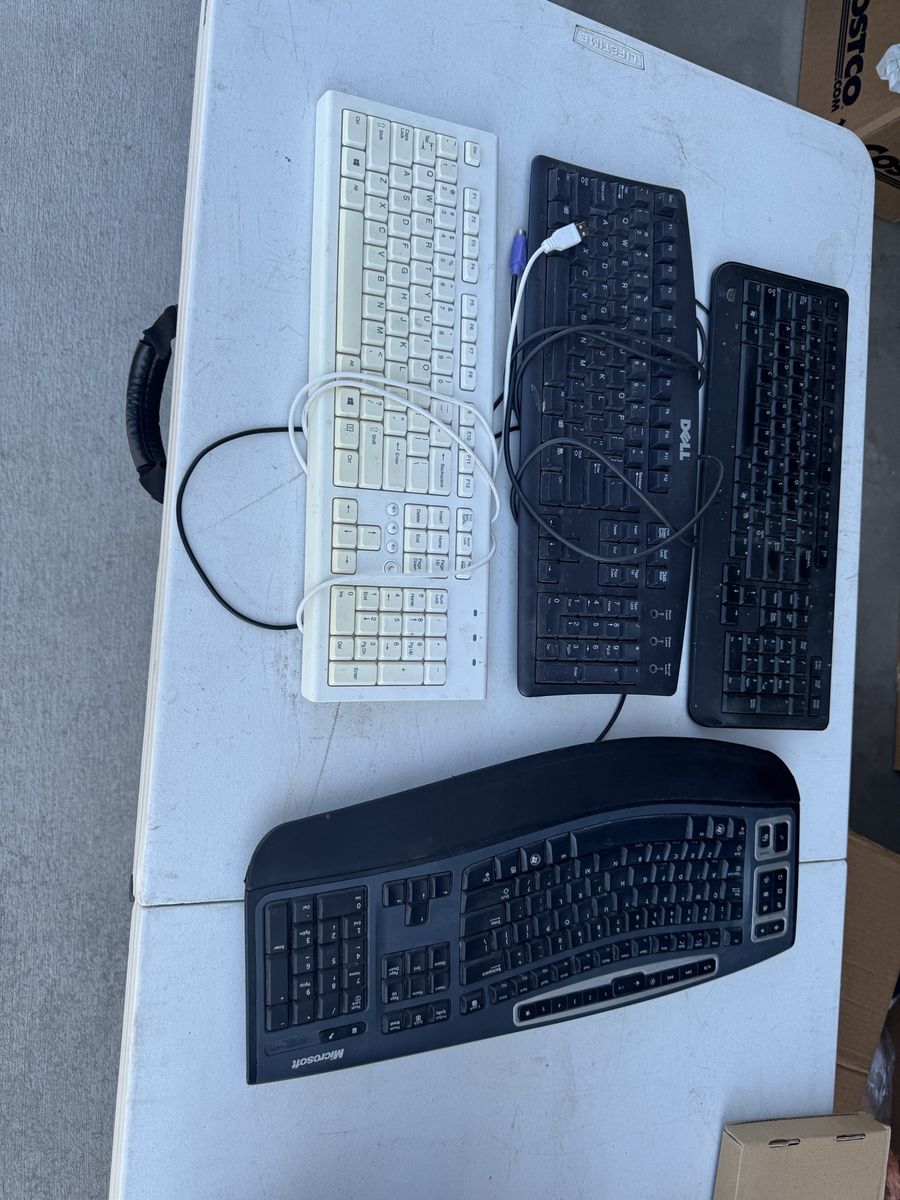 Lot of 4 Computer Keyboards - Dell, Microsoft, White & Black Wired Keyboards
