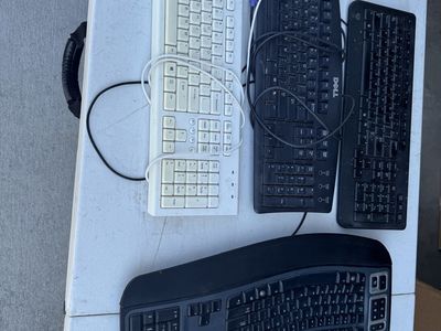 Lot of 4 Computer Keyboards - Dell, Microsoft, White & Black Wired Keyboards