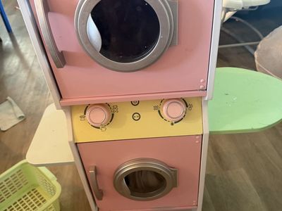 Kids play washer and dryer