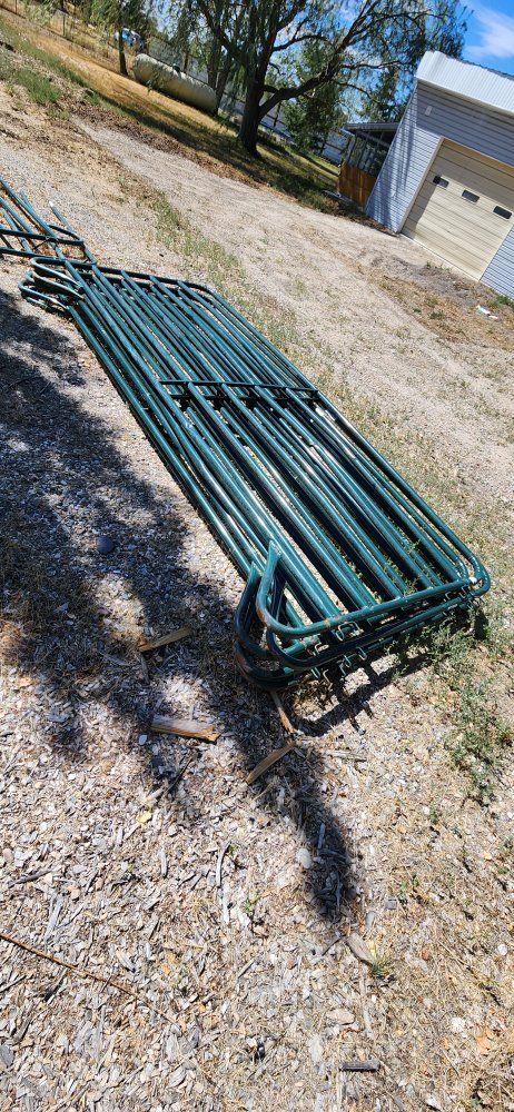 Corral panels and wire fence