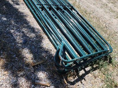 Corral panels and wire fence