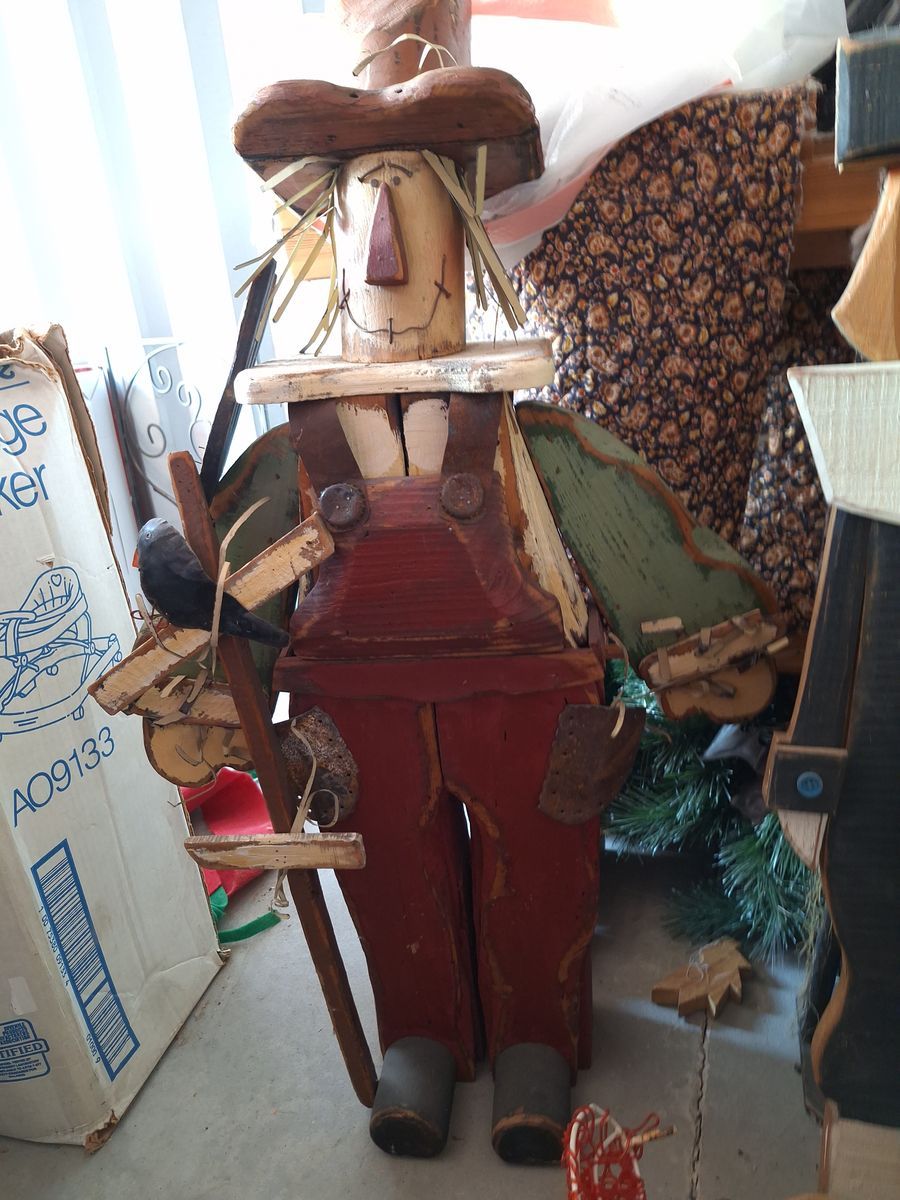 Vintage fall or halloween Wooden scarecrow