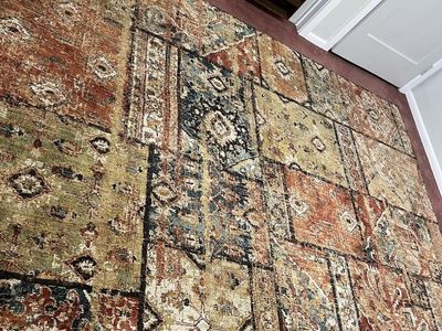8’x10’ multi colored area rug