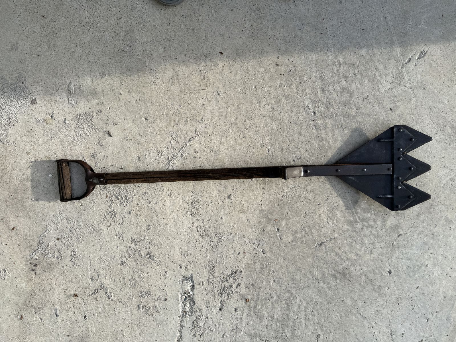 Antique hay cutting farm tool.
