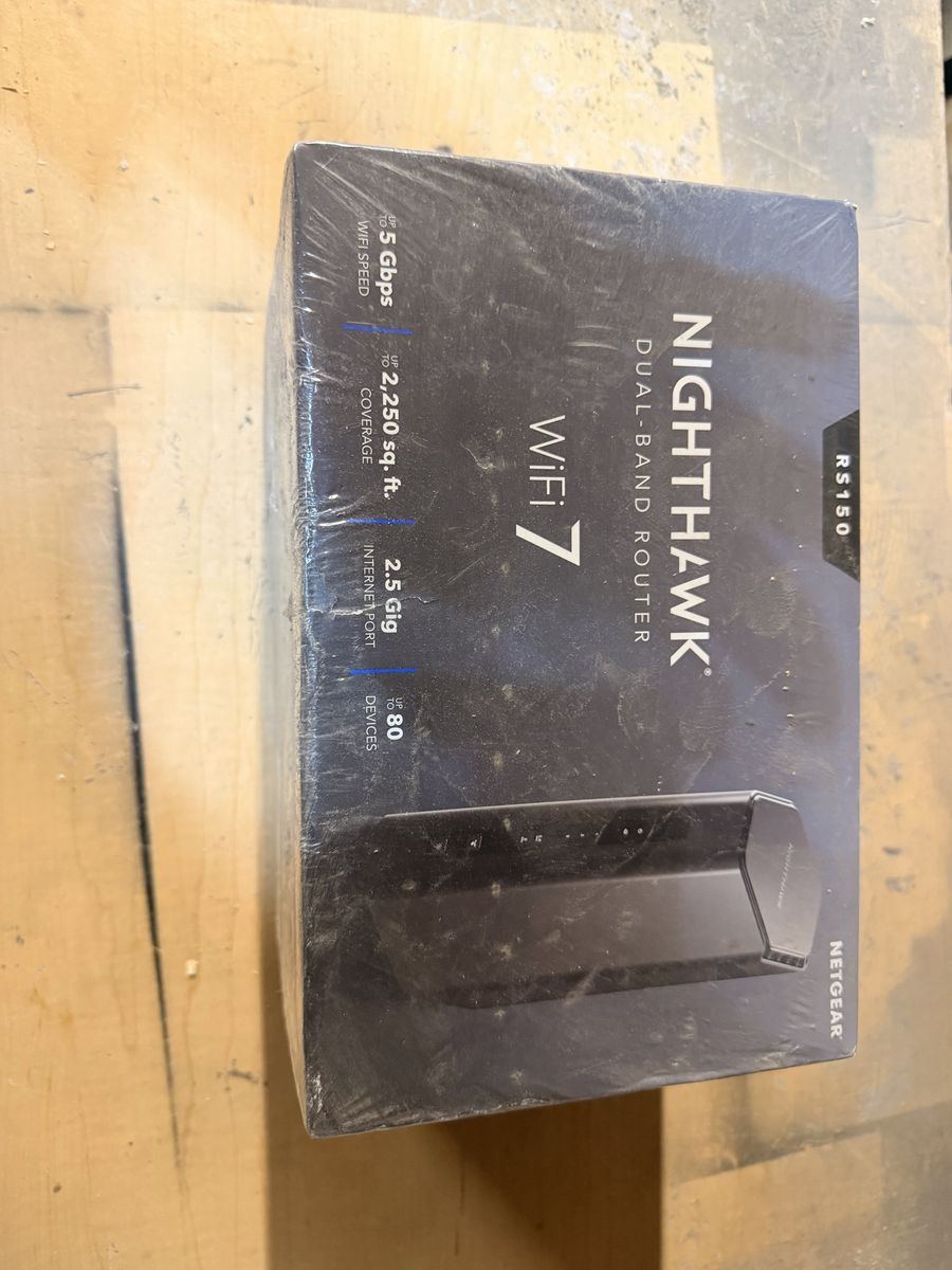 NETGEAR Nighthawk Dual-Band WiFi 7 Router (RS150) (Never opened-Still in plastic wrap)