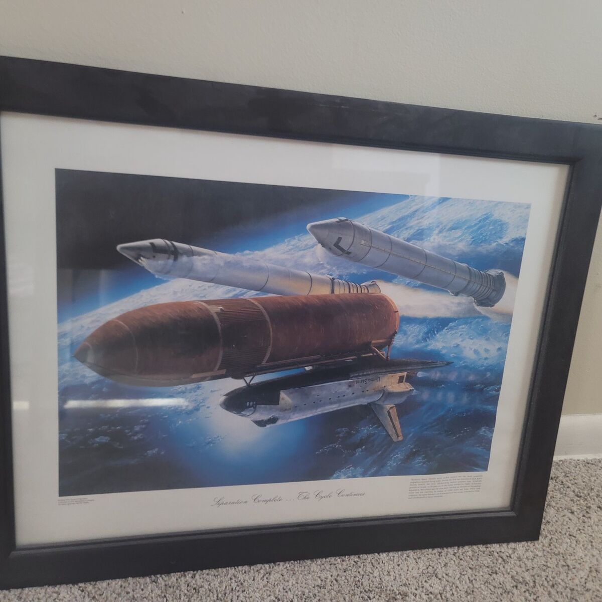 framed picture of space shuttle