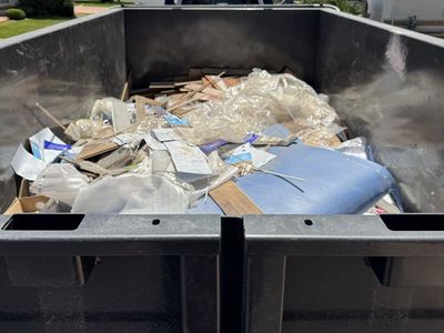 Driveway safe 15 yard dumpster rental and moving service!
