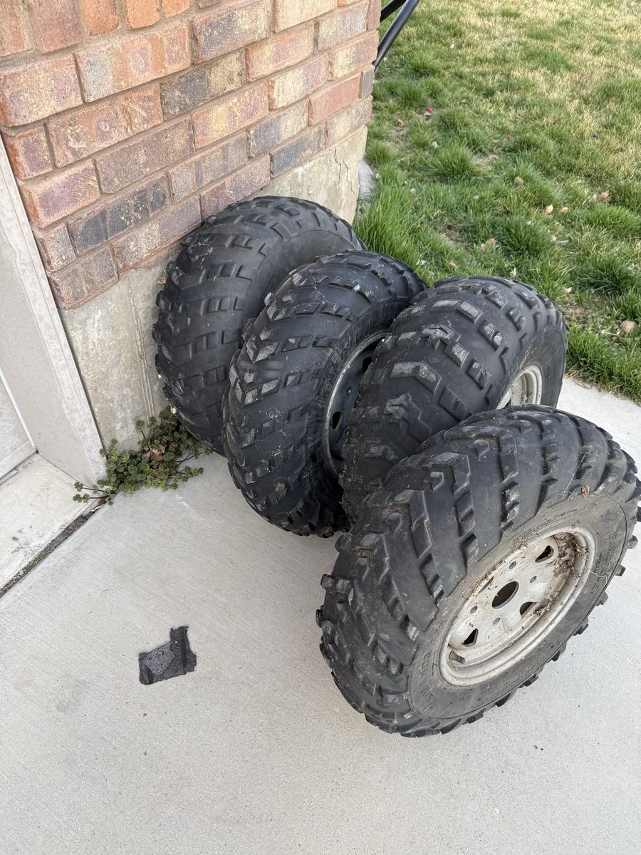 Four ATV Tires And Wheels