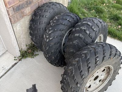 Four ATV Tires And Wheels