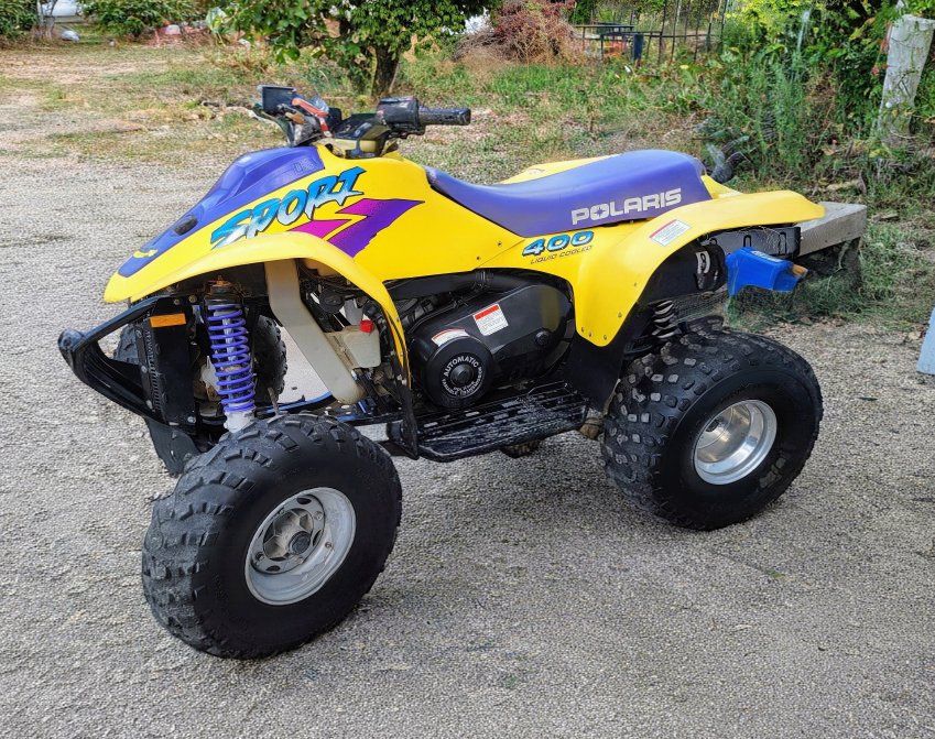 Polaris Sport 400 Liquid Cooled ATV 4-Wheeler - Yellow/Purple