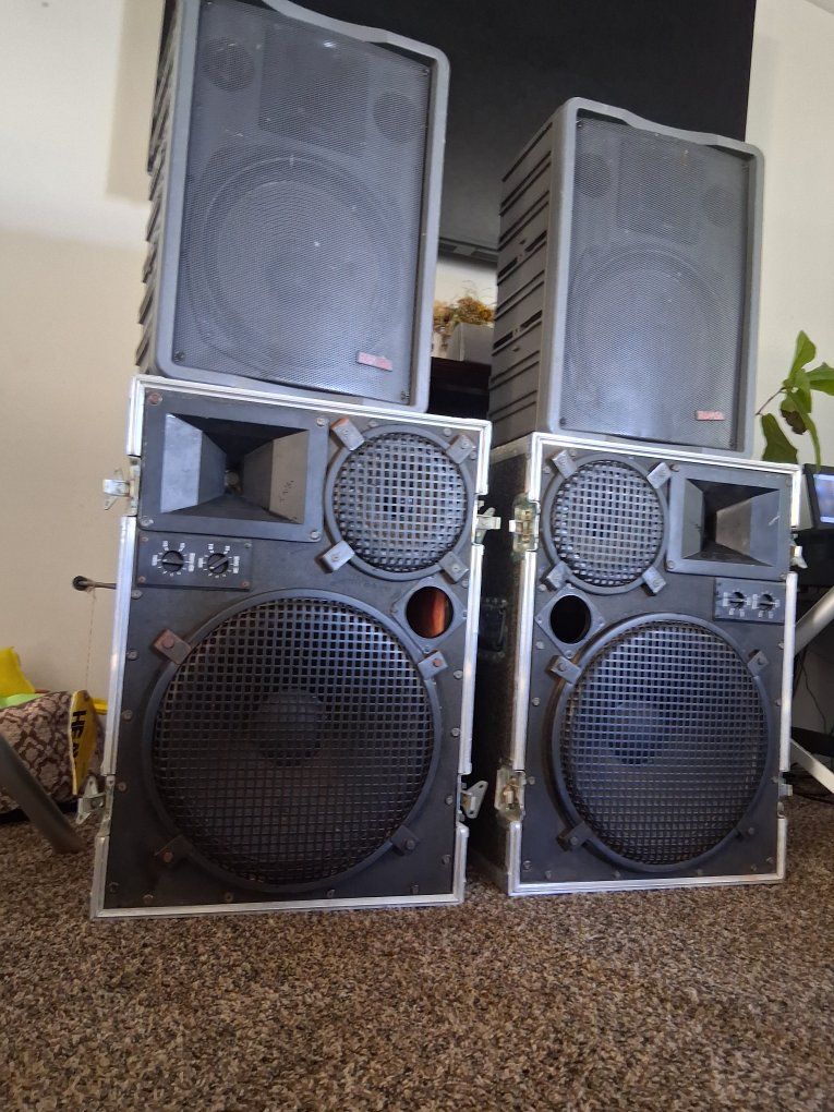 P.A. speakers with stands and cases