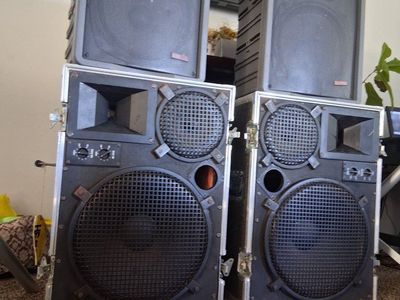 P.A. speakers with stands and cases