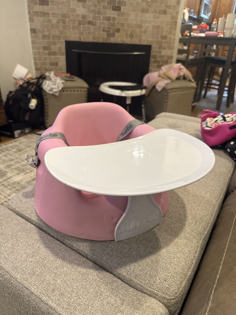 Bumbo seat with tray pink color strap included
