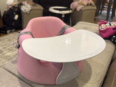 Bumbo seat with tray pink color strap included
