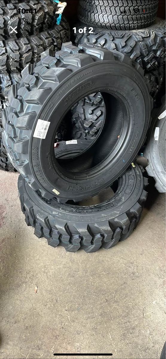 10-16.5 NEW PAIR OF HAFLINGER SKID STEER TIRES