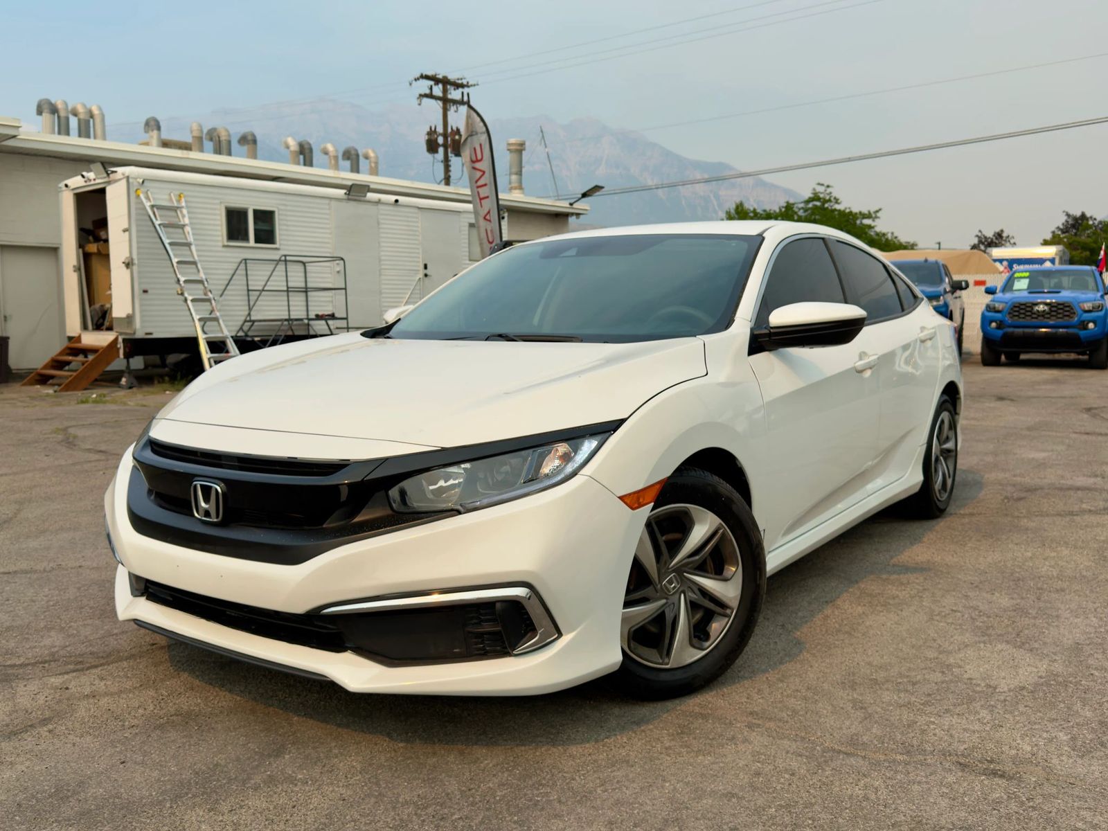 2020 Honda Civic LX — rebuilt & branded title, 30% below market