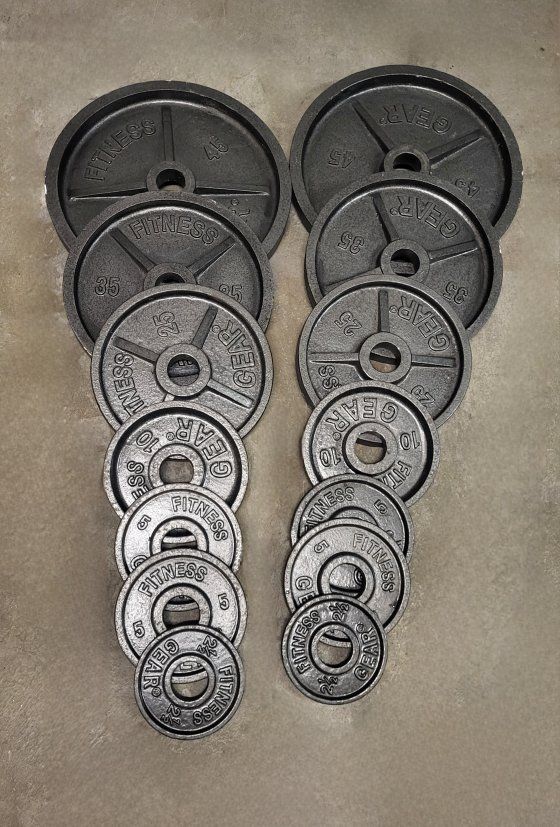 255 pounds of Olympic weights