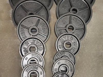 255 pounds of Olympic weights