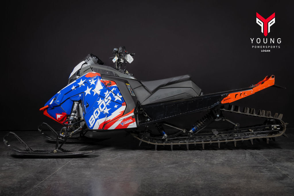 2025 Polaris® Boost RMK KHAOS 155 Storm Gray / Indy Red