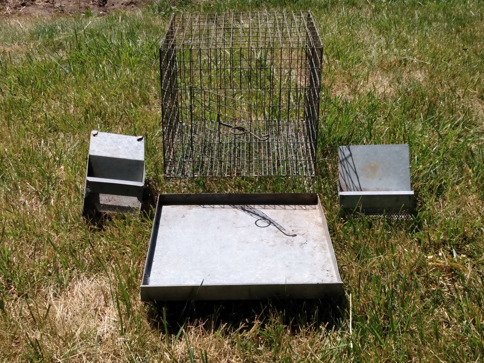 Rabbit or chicken cage with feeders