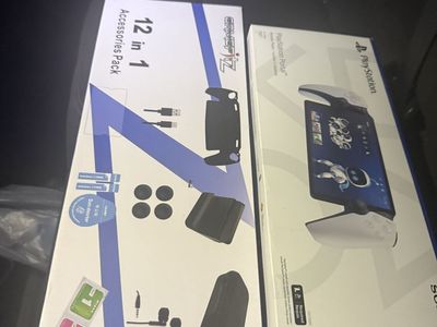 Unopened new Sony PlayStation Portal Remote Player with 12-in-1 Accessories Pack.