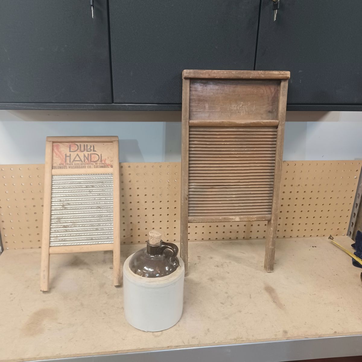 Washboards and whisky jug. $25 ea.