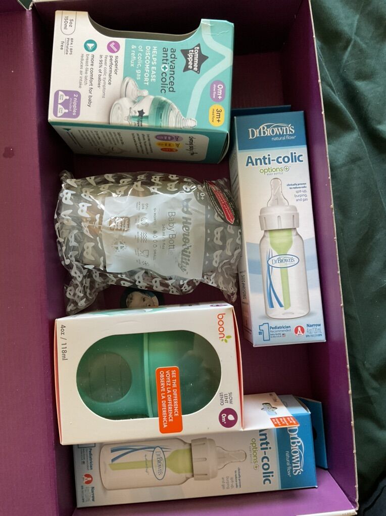 Box with Brand New Baby Bottles