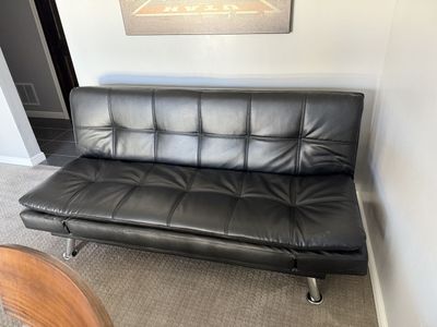 Adjustable Couch will fold To A Sleeper