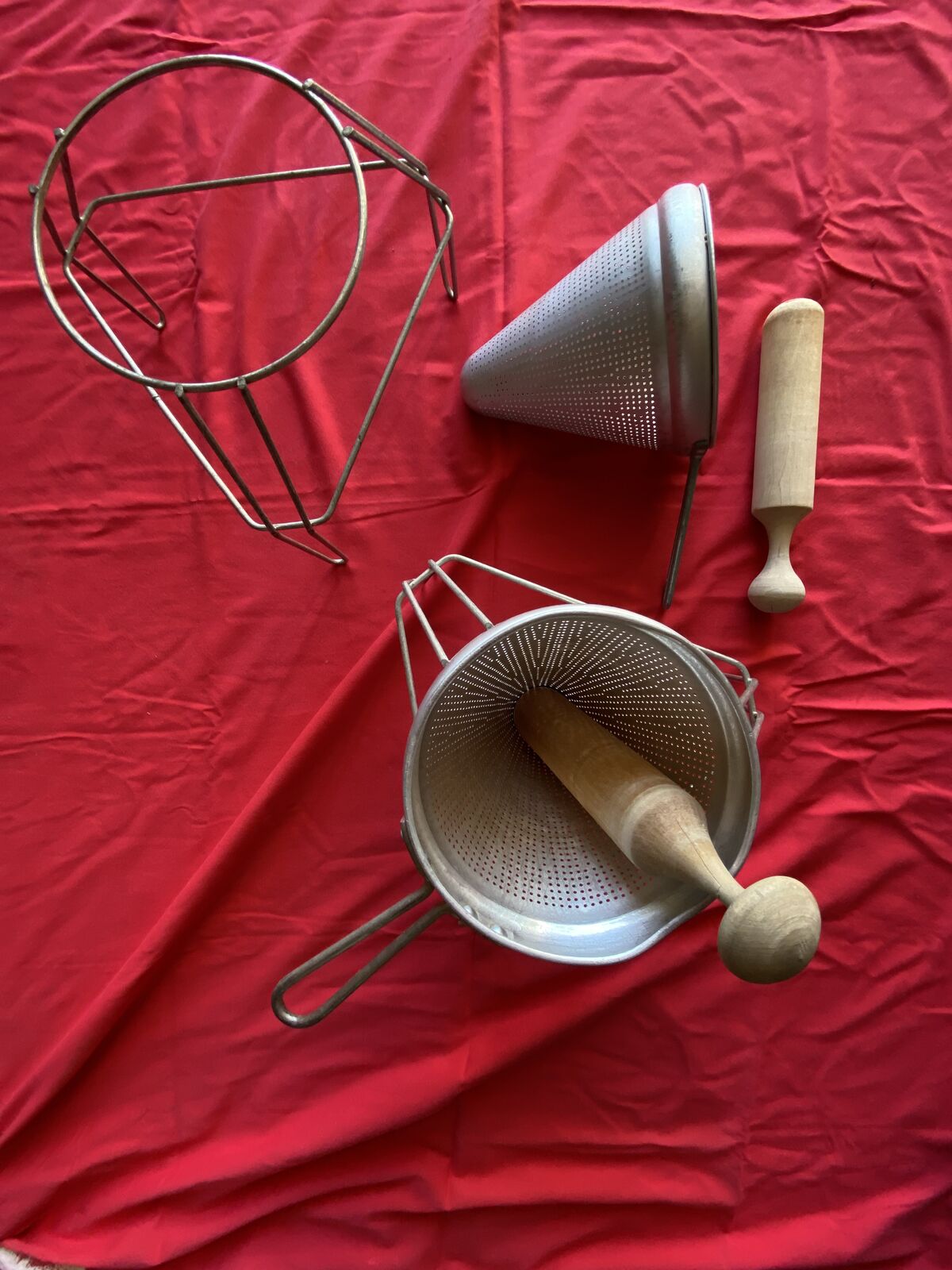 Two vintage hand juicers with pestles