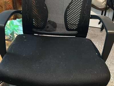 office chair and white tv stand