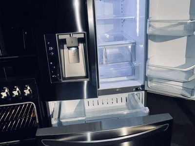 $2250 OBO INDUCTION RANGE AND STAILESS STEEL FRIDGE