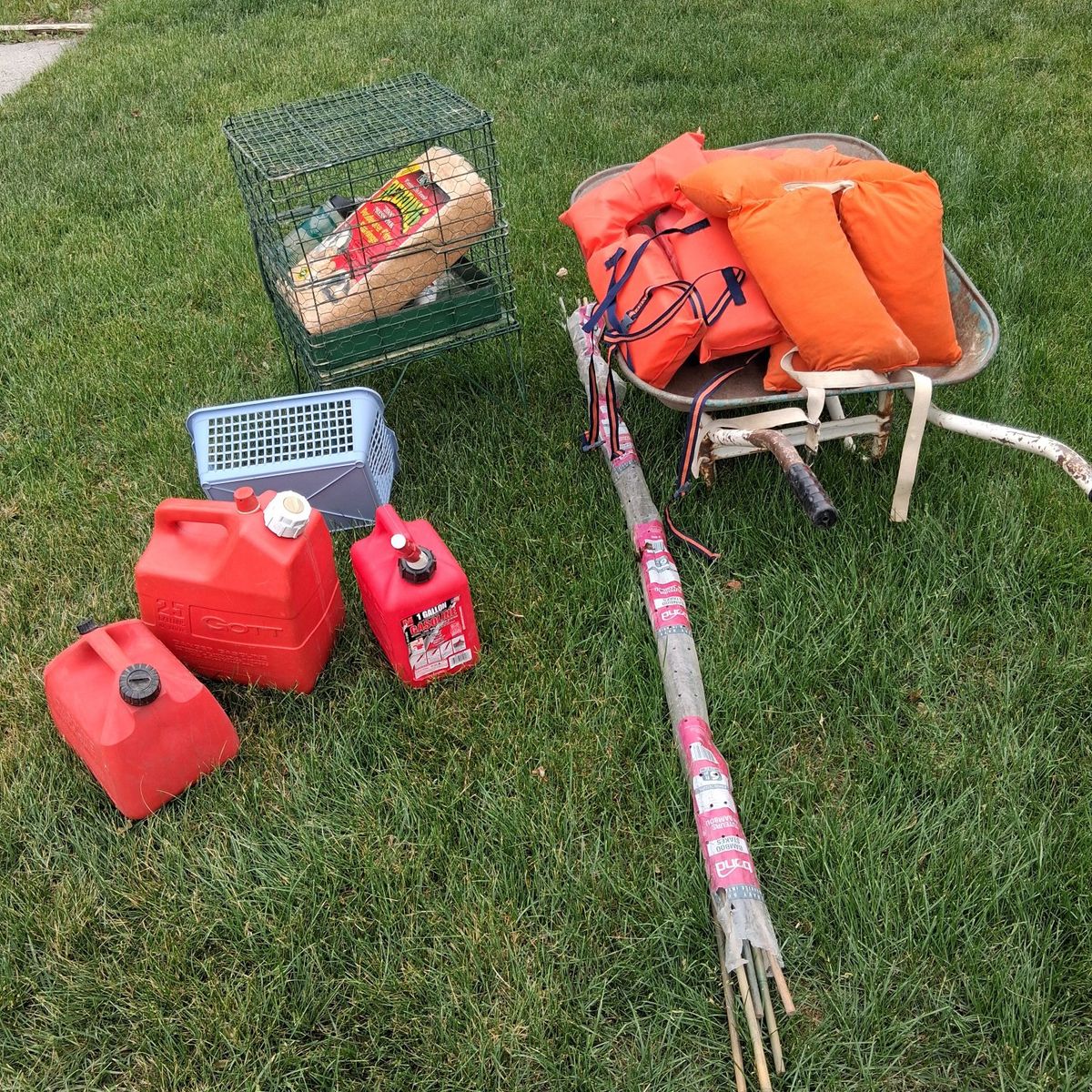 wheelbarrow,  plant stakes, gas cans