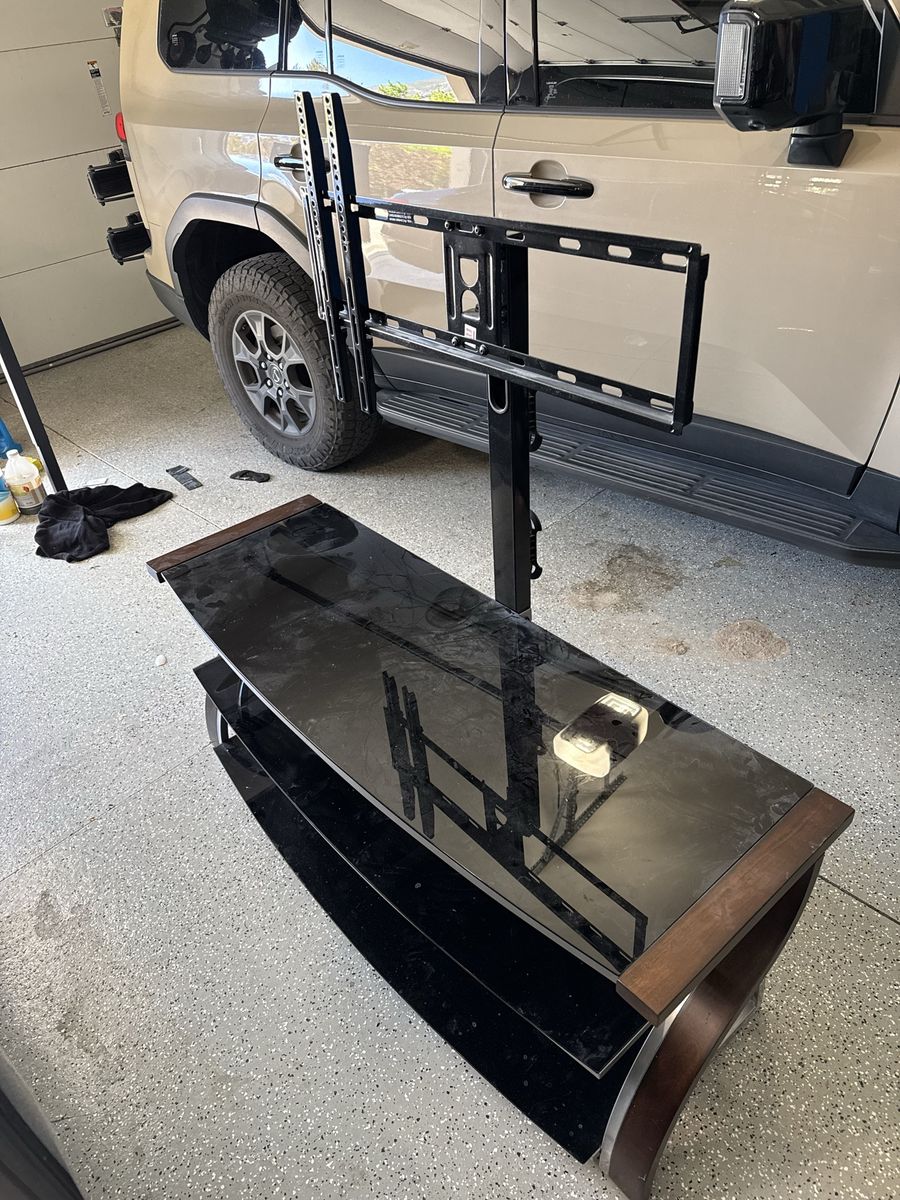Glass tv entertainment stand and mount. Super nice