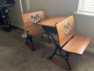 Antique student desks made by the American Seating Company.
