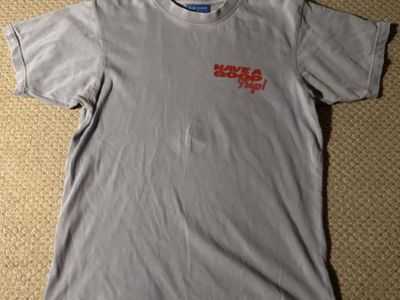 BLUE BISON Tee (Have a good trip!) on the back of the tee.