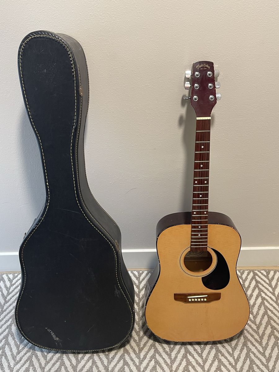 Hondo Guitar with hard carrying case