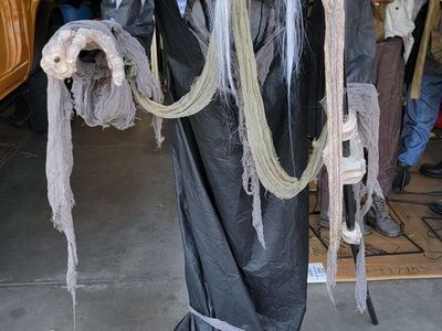 Life-Size Animated Reaper Halloween Prop with Light-Up Eyes, Sound, and Motion