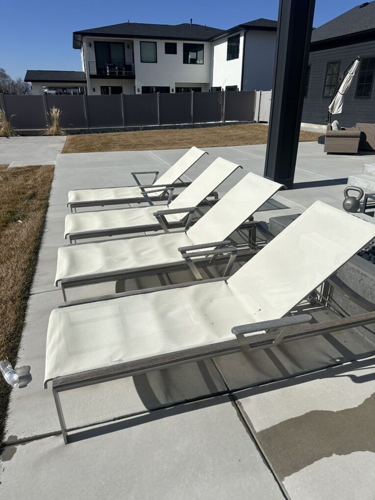 Four Outdoor Chaise Lounge Chairs