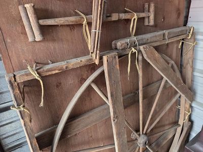 Antique Wooden Wagon Wheel and Farm Implement