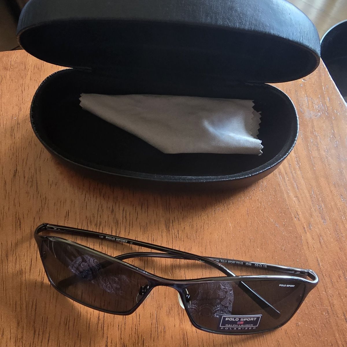POLO SPORT Metal frame sunglasses brand new, with hard leather case Originally $200 Now only $50 negotiable 