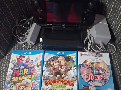 Nintendo Wii U Deluxe with 8 games! Trades considered!