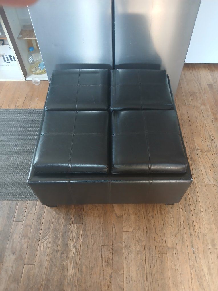 Black Faux Leather Ottoman with 4 Storage Cubbies & 4 Serving Trays - Versatile & Space-Saving