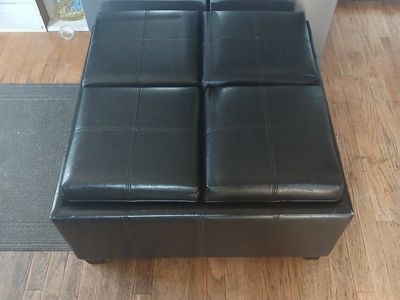 Black Faux Leather Ottoman with 4 Storage Cubbies & 4 Serving Trays - Versatile & Space-Saving